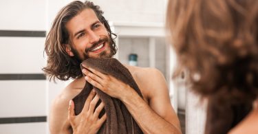 how to clean up a beard while growing it out